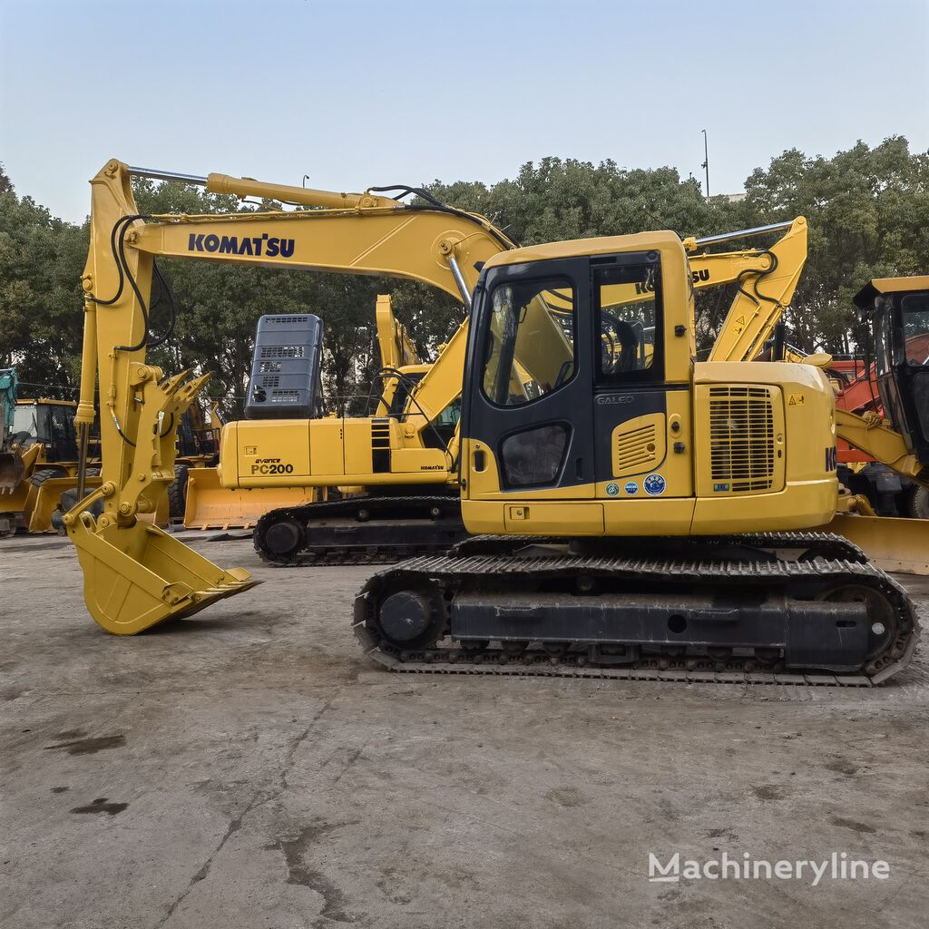 Komatsu pc128us bager gusjeničar