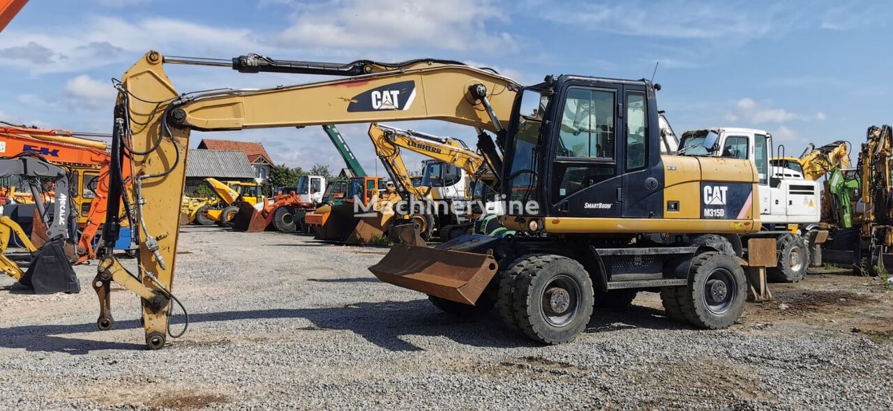 Caterpillar M315D bager točkaš